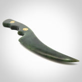 Hand made Jade knife with inset cartridge heads. Carved from a lovely piece of local New Zealand Jade. The quality of the workmanship and design is outstanding - this is a gorgeous display piece.